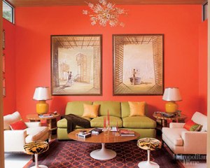 Loosley a split-complementary red orange, red-violet, and green (though the couch is really more of a yellow-green)