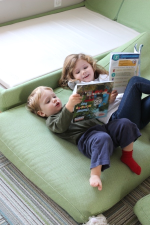 Yesterday Sofia and Charlie spent like and hour "reading" together on our dismantled chaise. 